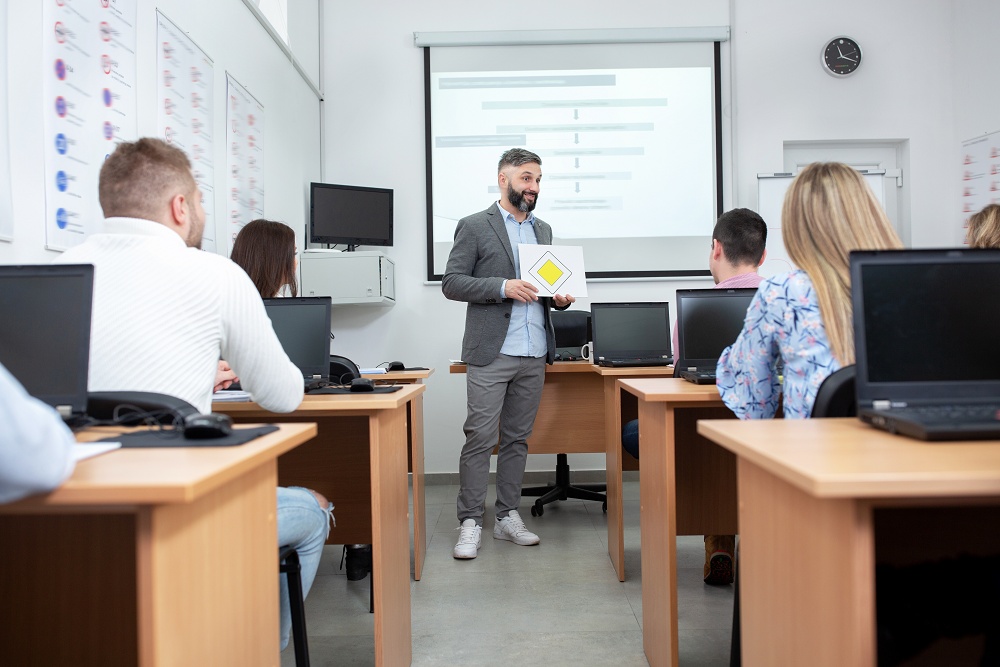 Instructor teaching driver safety course